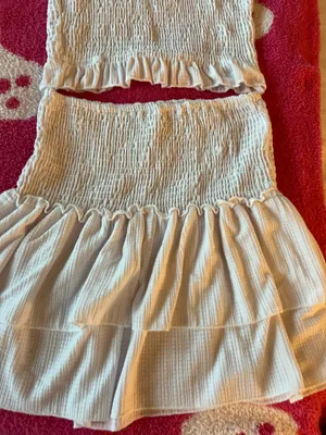 Lulus Chic white smocked two-piece set with ruffle details. Perfect for a stylish look. thumbnail 2
