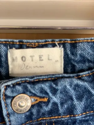 Motel Denim Raw Hem Mini Skirt - size S Model Off Duty thumbnail 2