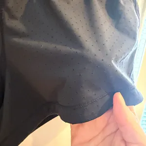 This is a pair of black Lululemon Final Lap running shorts! size 6! thumbnail 2