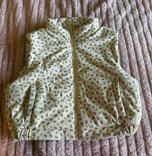 Women’s Puffer Vest in Cream with Green Floral Print thumbnail 1