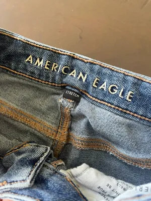 ripped jeans thumbnail 2