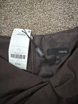 Sleek sleeveless midi sheath dress by next. Subtle knot detail at the neckline. thumbnail 3