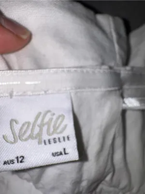 Selfie Leslie Off-Shoulder Ruffle Crop Top in Cream thumbnail 9