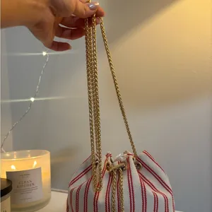 Striped Red and White Linen Bucket Bag thumbnail 7