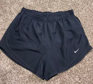 Nike Women's black running shorts large thumbnail 1