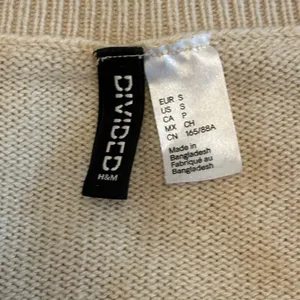 H&M Cream and Black Striped V-Neck Sweater thumbnail 3