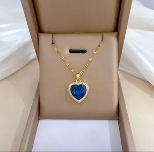 Gold necklace with blue heart thumbnail 2