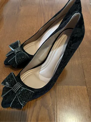 BCBGeneration Black Pointed-Toe Heels with Rhinestone Bow Accent thumbnail 3