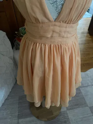 This orange Abercrombie & Fitch mini dress features a deep V-neckline, a ruched waistband, and a flared chiffon skirt thumbnail 3