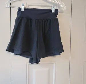 Bundle of XS's and smalls exercise workout shorts in black and navy blue. thumbnail 1