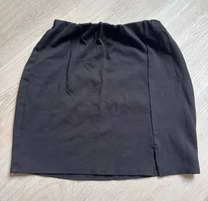 Classic Black Mini Skirt with Subtle Front Slit thumbnail 1
