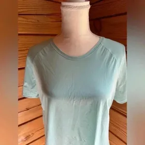 LULULEMON Size 8 teal top with vented sides​ thumbnail 3