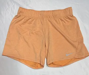 Nike Women's Light Peach Athletic Shorts with Reflective Swoosh thumbnail 1