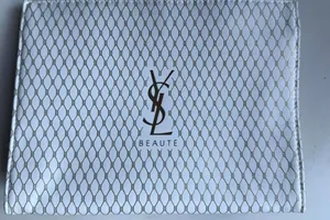 Yves Saint Laurent Beaute White Clutch Bag with Gold Mesh Pattern thumbnail 1