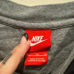 Nike gray top with mesh accents and drawstring bottom hem size XL thumbnail 3