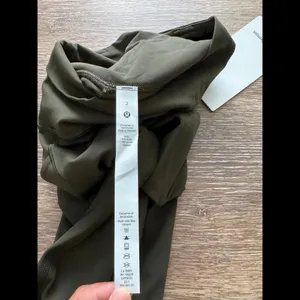 Lululemon Align With Pockets High Rise 25” Dark Olive Size 2 NWT thumbnail 4