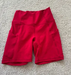 Red Fabletics biker shorts  thumbnail 1