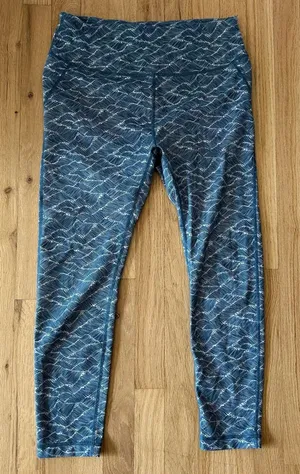 Vuori Pace High Rise Printed Leggings in Navy Wave blue crop size large thumbnail 1