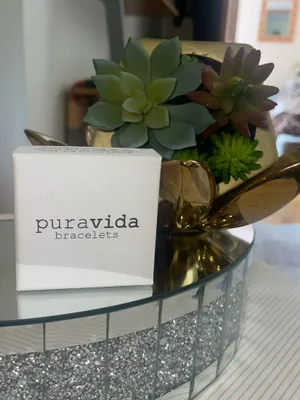 This is a Pura Vida bracelet featuring a dainty gold-tone wave charm thumbnail 4