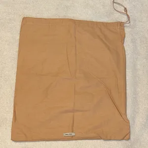 Miu Miu Light Brown Dust Bag thumbnail 1