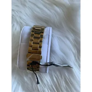 Kenneth cole women’s gold watch with little diamonds new battery thumbnail 2