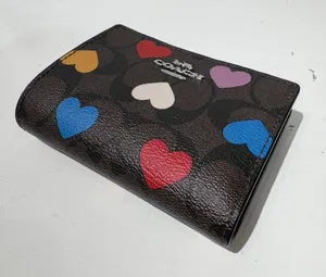 coach Bifold Wallet In Signature Canvas With Heart Print cp424 thumbnail 1