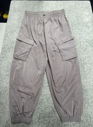 Under Armour Womens Unstoppable Wvn Sheen Cargo‎ Pants Mauve 1389672 Size Large thumbnail 1