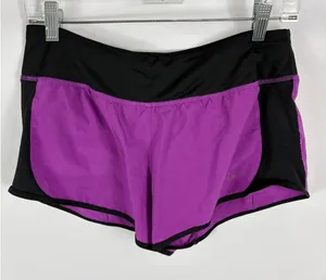 Nike Dri Fit Purple Black Running Shorts Womans Size Medium thumbnail 1