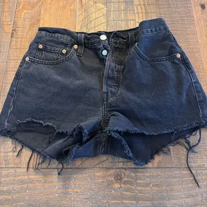 Levi's Black Cutoff Distressed Denim Shorts thumbnail 1