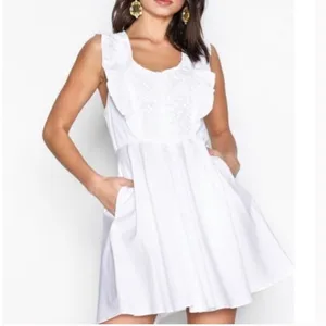 Free People “half moon”white mini dress with floral lace inset & ruffles.Size XS thumbnail 7