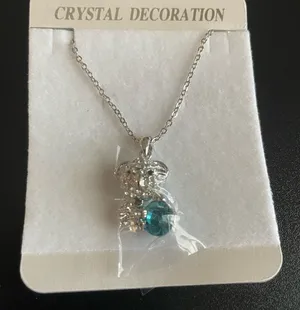 Sloth with blue crystal necklace thumbnail 1