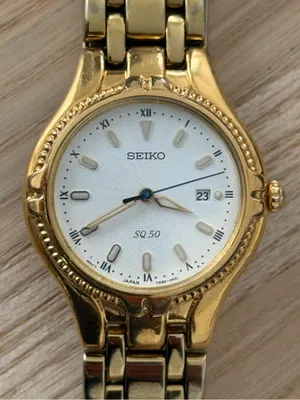 Seiko Vintage Watch Gold Bracelet Case White Dial Blue Gold Hands Date Window thumbnail 1