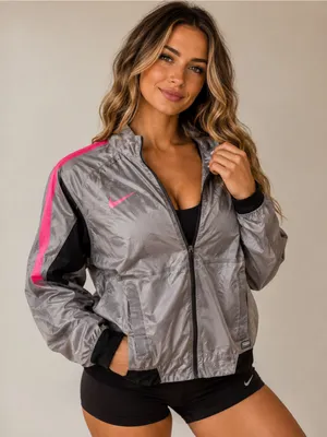 Nike Women’s Gray Pink Lightweight Running Windbreaker Jacket thumbnail 1