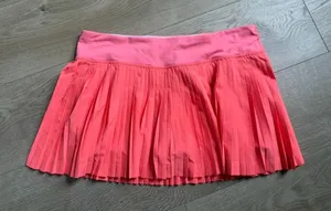 EUC Women Lululemon Pleat To Street Skirt II Grapefruit neon tennis skirt Size 8 thumbnail 1