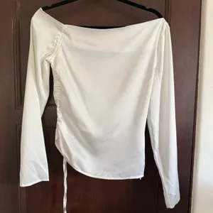REFORMATION | White Jacquard Satin Allira Asymmetrical Off Shoulder Blouse | 0 thumbnail 2
