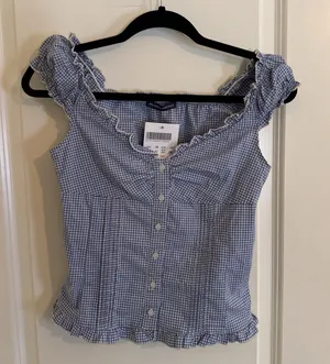 Brandy Melville Blue White Gingham Elara Button Front Ruffle Top One Size NWT thumbnail 1