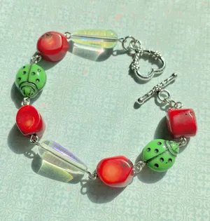 Handmade whimsical Kawaii unique ladybugs Czech glass beads bracelet🐞💚 thumbnail 1