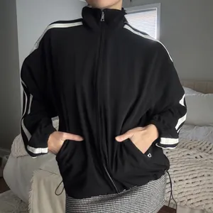 Athleta black and cream cinchable adjustable zip up track jacket thumbnail 2