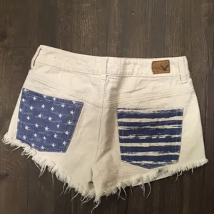 American Eagle Americana Hi-rise festival cutoff white denim shorts thumbnail 2