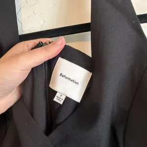 Reformation | Auli Halter Wool-Blend Peplum Vest Top in Black | size 2 thumbnail 7
