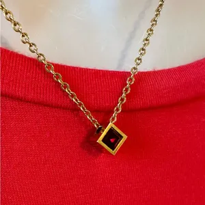 Beautiful Gold Necklace with a Ruby Colored Stone thumbnail 2
