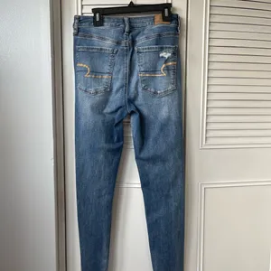 American Eagle dark blue washed jeans. thumbnail 5
