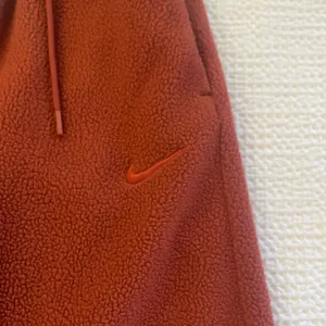 Nike women’s plush teddy fleece Sherpa cozy fall winter wide leg pants thumbnail 2