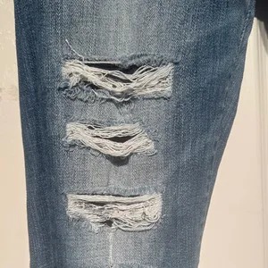 Buckle Light Blue Distressed Skinny Jeans thumbnail 2