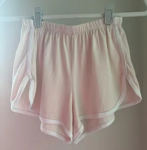 Brandy Melville Pink Track Shorts  thumbnail 1