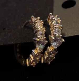 Gold tone CZ Huggie Hoops | Baguette + Round Crystals thumbnail 1