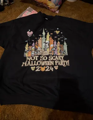 Join the fun with this Gildan Not So Scary Halloween Party 2024 sweatshirt. Features playful graphics in black. thumbnail 1
