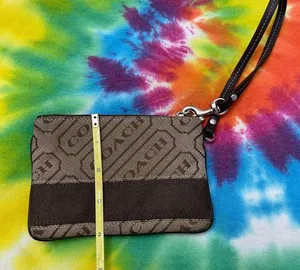 💜COACH Signature Stripe Lozenge Wristlet in Brown and Tan Fabric thumbnail 2