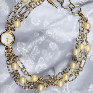 Anne Klein Women's Chunky Bracelet Watch Gold Faux Pearl Wrap Bracelet thumbnail 2