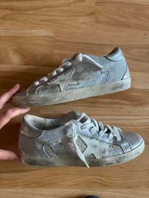 GOLDEN GOOSE Super-Star Iridescent and Glitter Leather Sneakers - Sz 38 - US 7 1/2 These are in good condition with light wear throughout. They are a pretty hard to find but super cute style. They have like holographic leather and glitter areas. Please see pics for details. Metallic leather upper Round toe Lace-up closure White leather star Cushioned insole; unlined Rubber sole Made in Italy thumbnail 3